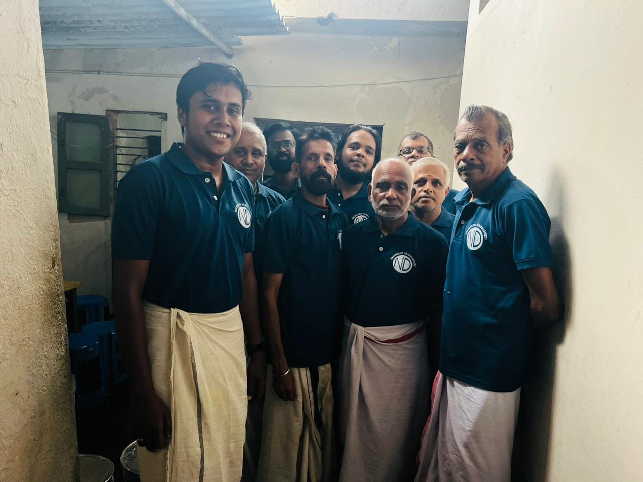 Naludesam team standing inside the event kitchen