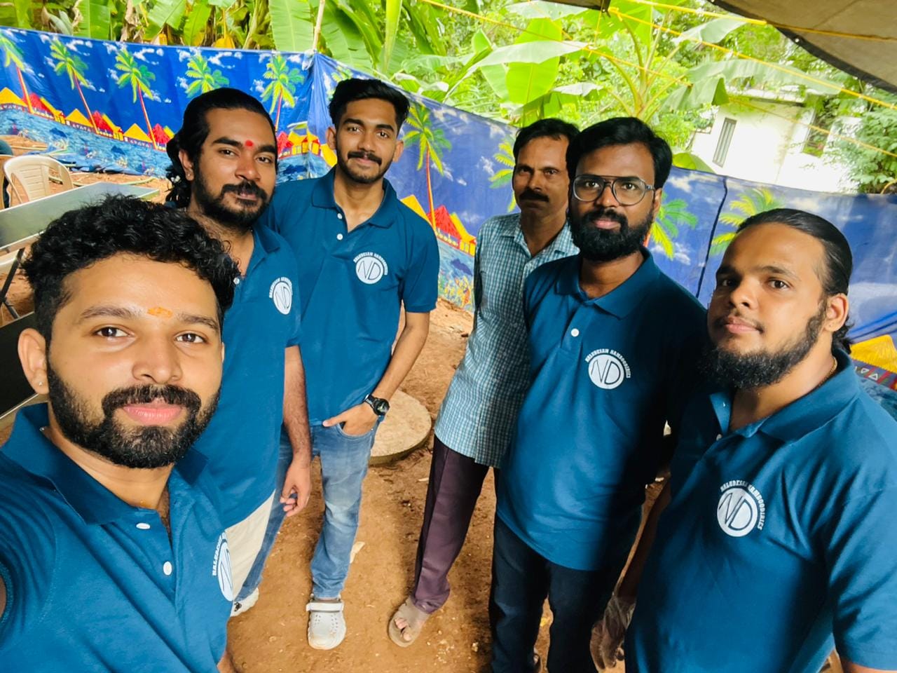 Naludesam event team gathered at an outdoor venue