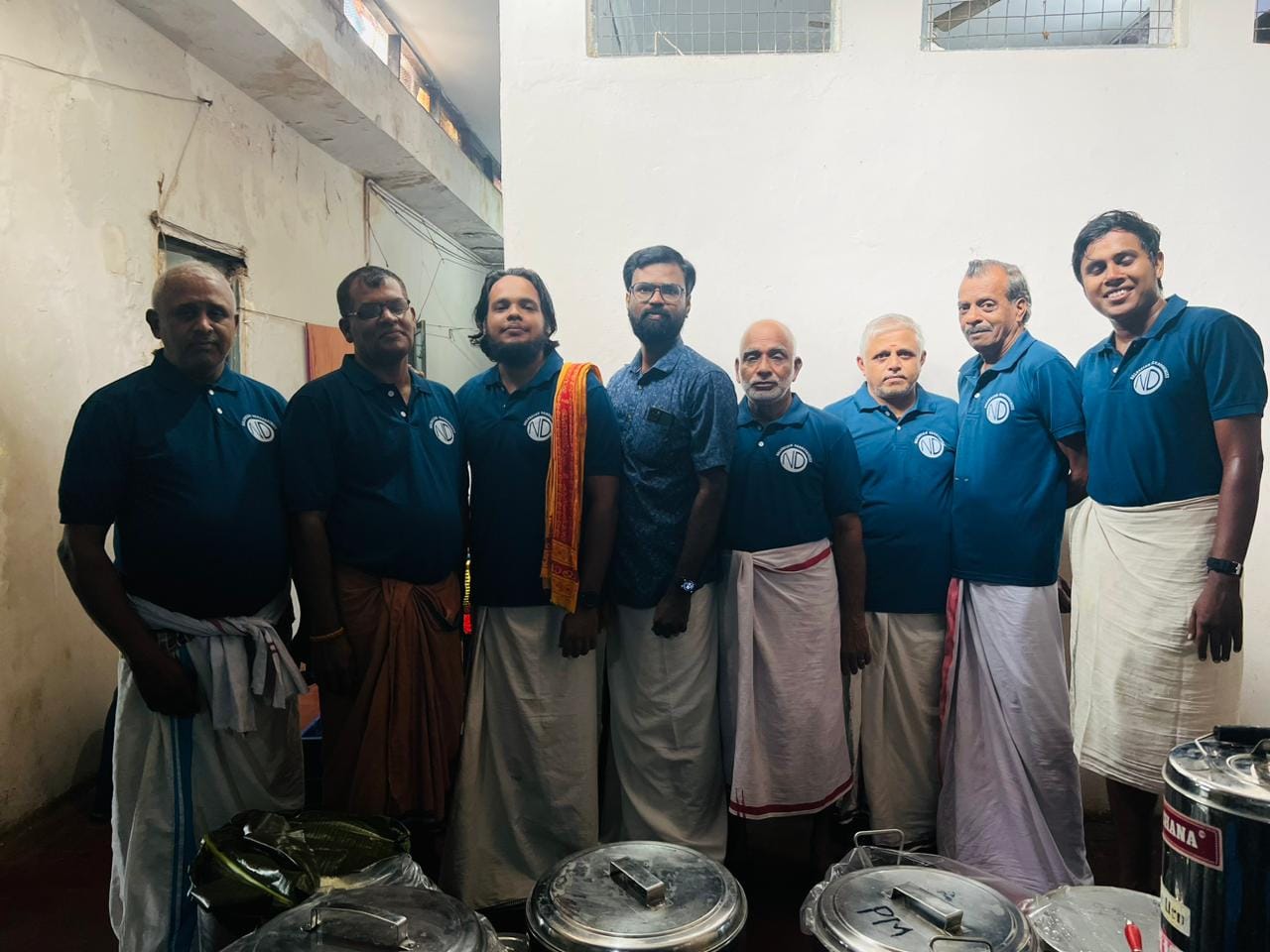 Naludesam kitchen crew beside catering vessels